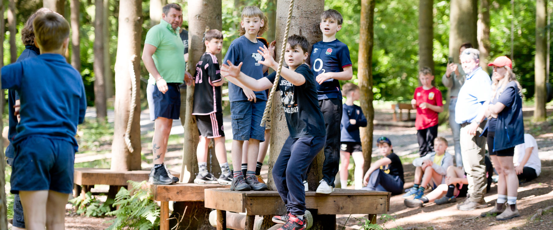 children on low ropes